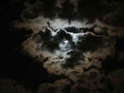hidden moon contrasting clouds.jpg (132404 bytes)