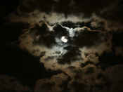 lumpy moon contrasting clouds.jpg (132961 bytes)