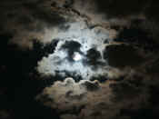 puffy clouds moon in full view.jpg (138364 bytes)
